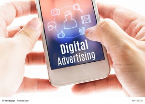 Close up hand holding mobile with Digital Advertising and icons, Digital Marketing concept.